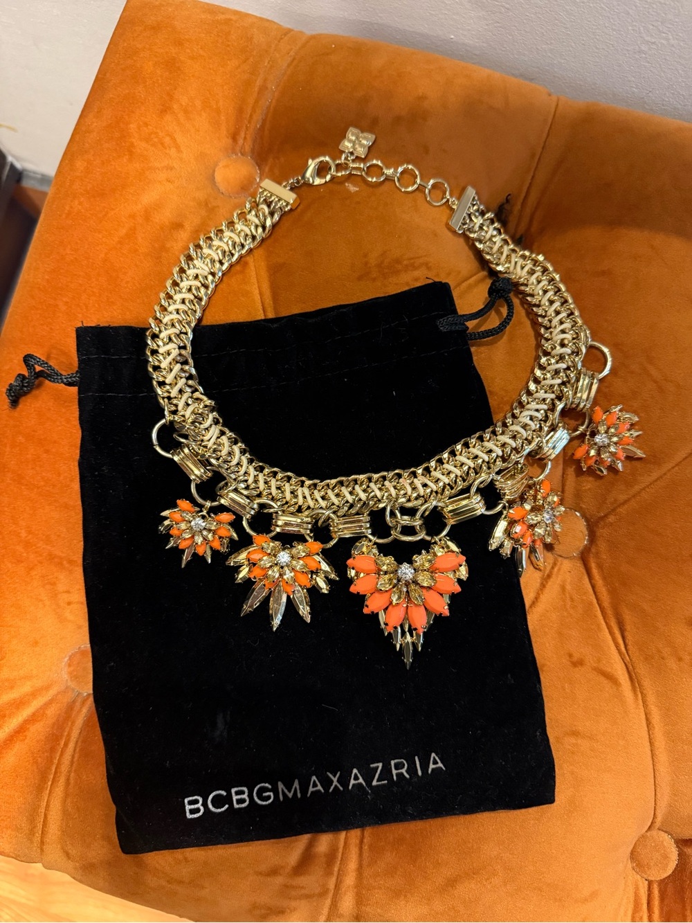 BCBGMaxAzria Gold Necklace with Orange Floral Crystal Charms